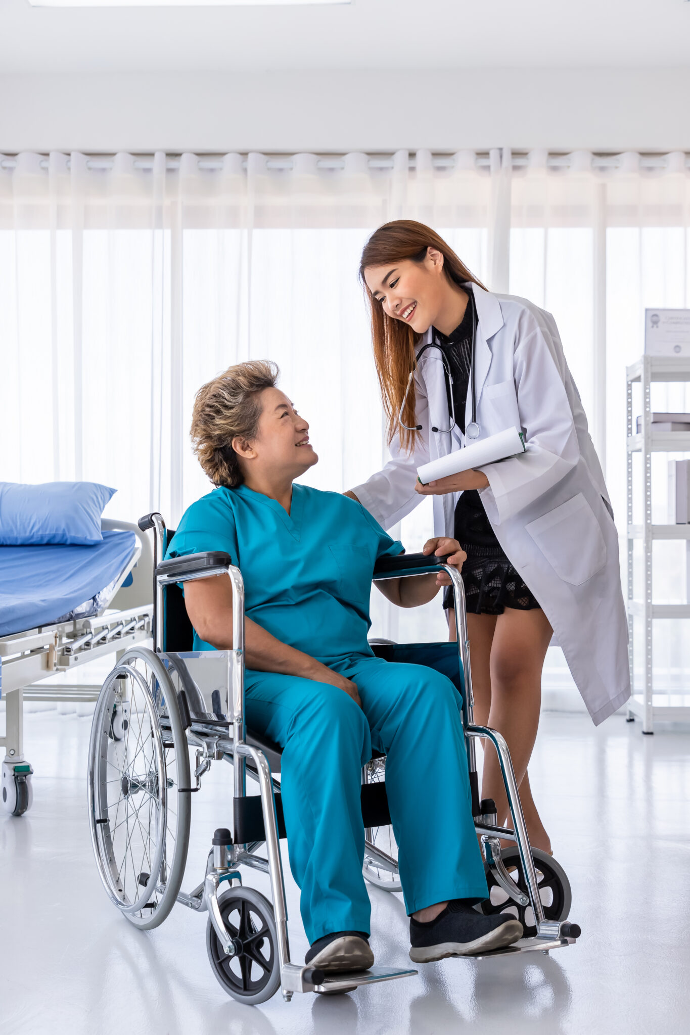 asian medical doctor take care senior elderly woman female patie